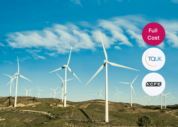 Wind turbines across a hillside under a clear sky, suitable for courses on renewable energy or environmental sustainability.
