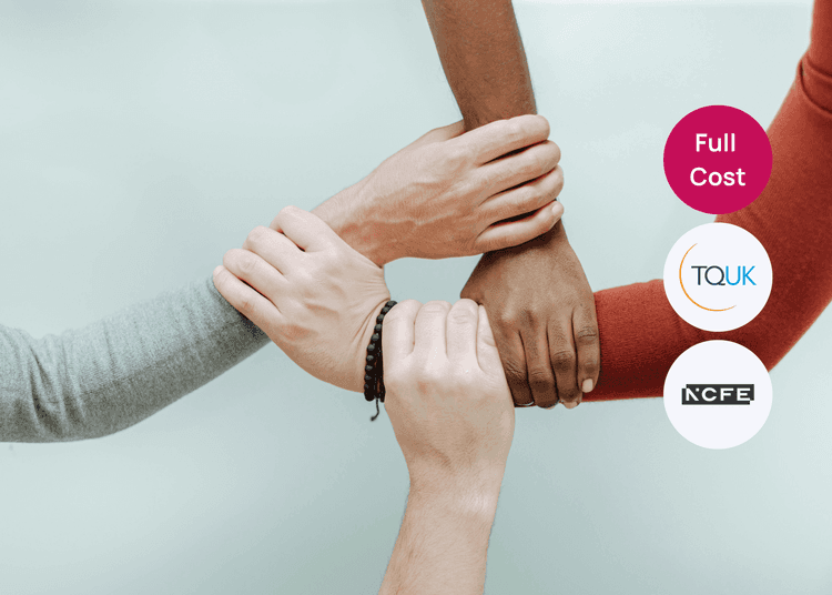 Four hands of different skin tones gripping each other’s wrists in a supportive circle, relevant to equality and diversity training.