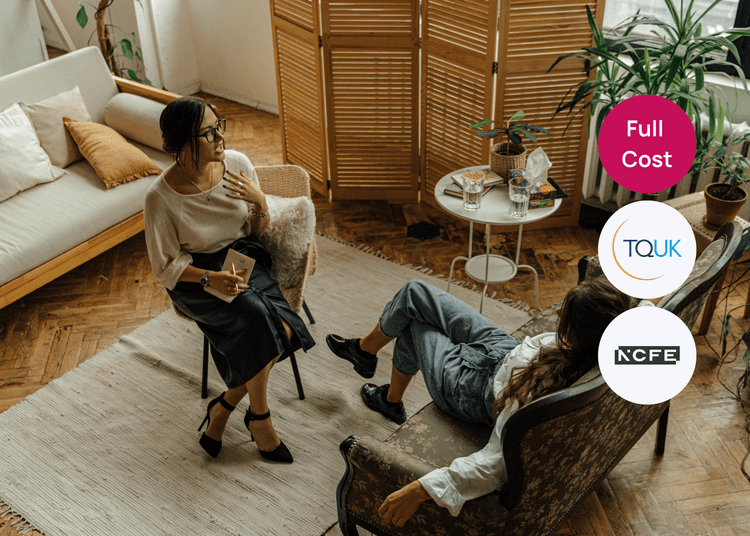 Counsellor sitting opposite a client reclining on a sofa in a calm room, relating to mental health or counselling training.
