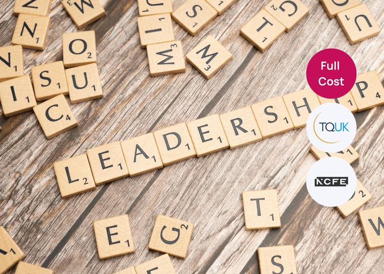 Scrabble style tiles spelling the word leadership on a wooden surface, with scattered letters around the board.