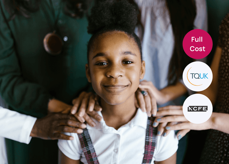 Child standing with supportive hands on her shoulders from adults around her for child safeguarding training.