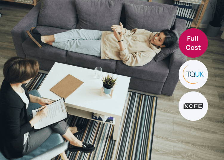 Person lying on a sofa speaking to a counsellor taking notes during a counselling session in a calm room.