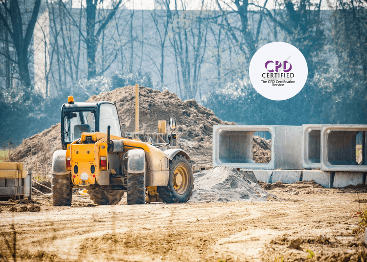 A yellow steamroller, heavy construction machinery drives in a construction site with cinder blocks and gravel.