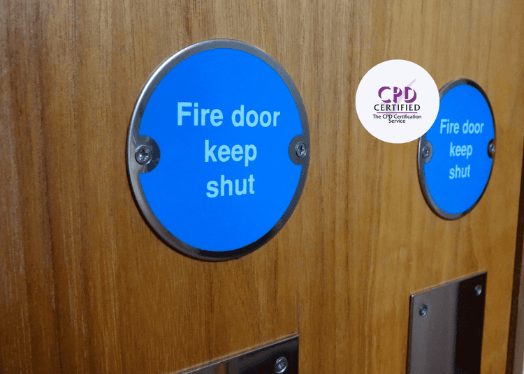 Blue "Fire door keep shut" signs on wooden doors, highlighting essential fire safety compliance for CPD Fire Door training.