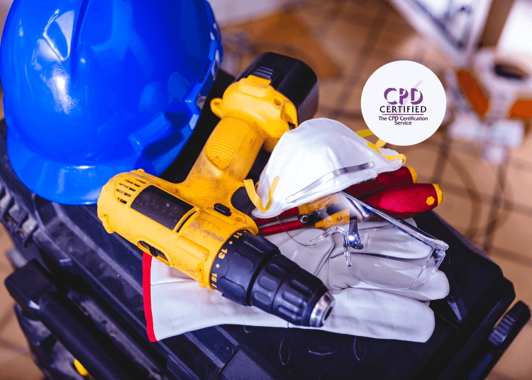 Tool box with different types of personal protective equipment (PPE) on top, including a hardhat, mask, and gloves.