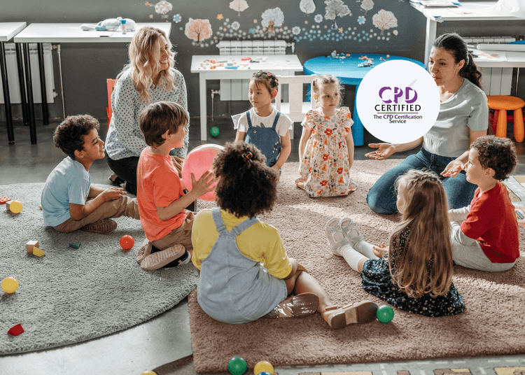 Children sitting in a circle on a rug with two adults in a brightly lit classroom.