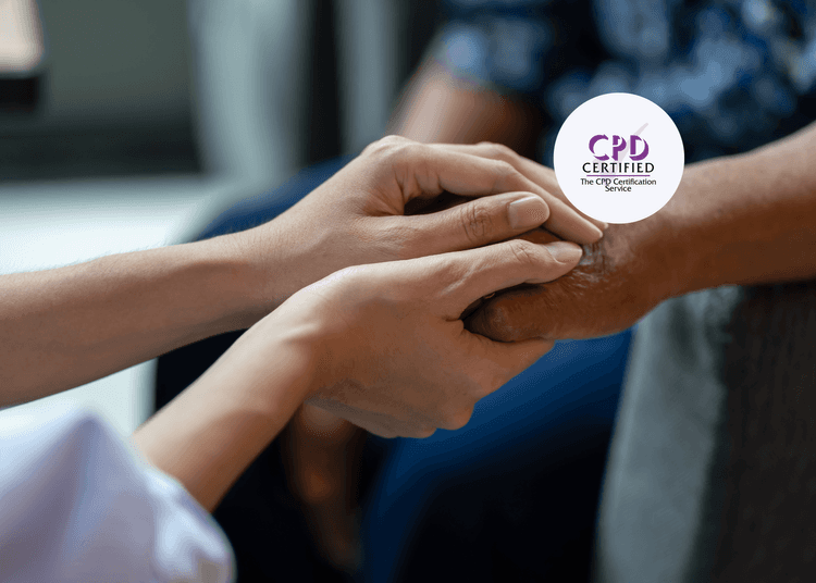 Close-up of one person gently holding the hands of another in a comforting gesture.