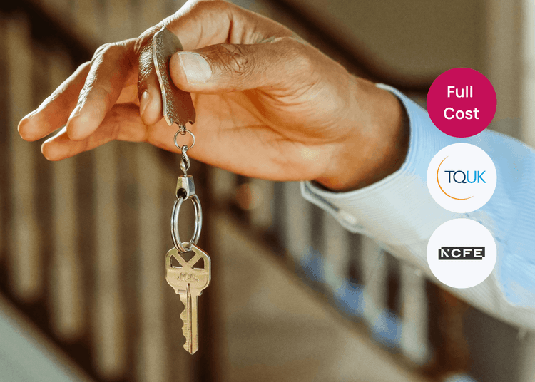 Hand holding a metal house key on a keyring, shown close up for a Level 2 course image.