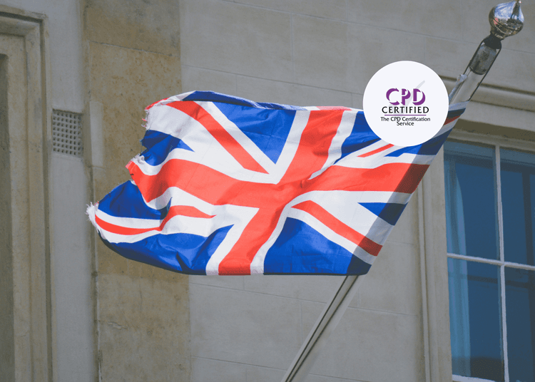 Union Jack flag mounted on a building, slightly torn at the edges, blowing in the wind expressing British values.