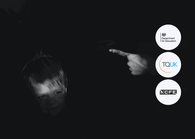 Young boy in shadow with only part of his face lit, and a pointing adult hand visible in the dark.