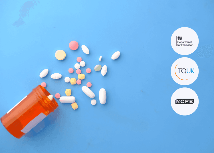 Various pills and tablets spilled from an orange medicine bottle onto a blue surface, arranged in a scattered pattern.