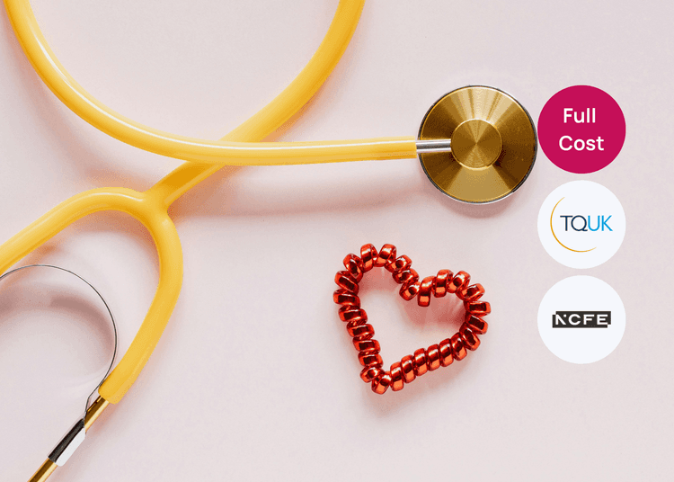 Stethoscope placed next to a red heart shape, symbolising core themes in health care and wellbeing training. Yellow stethoscope on a pale background beside a small red heart shape for health care training.