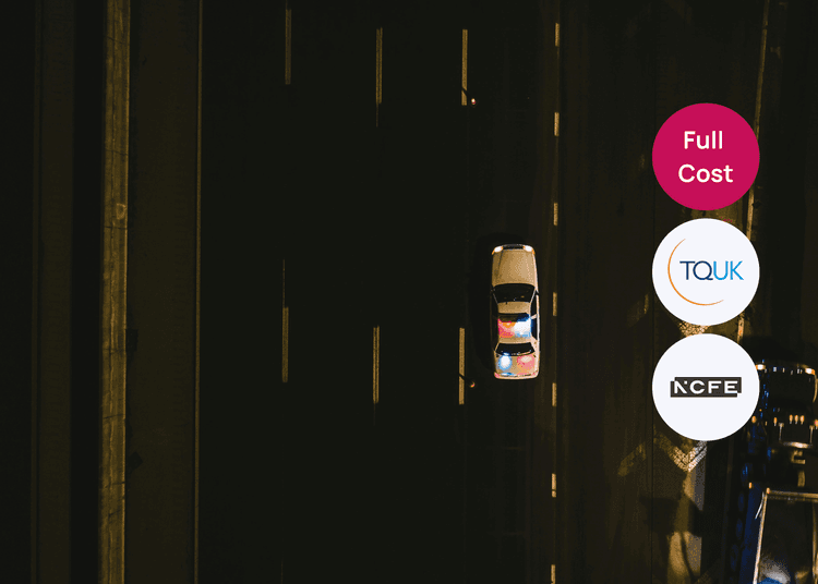 Overhead view of a police car with lights on along a dark roadway, highlighting emergency response activity. Police car with flashing lights parked on a dark road at night, viewed from above.