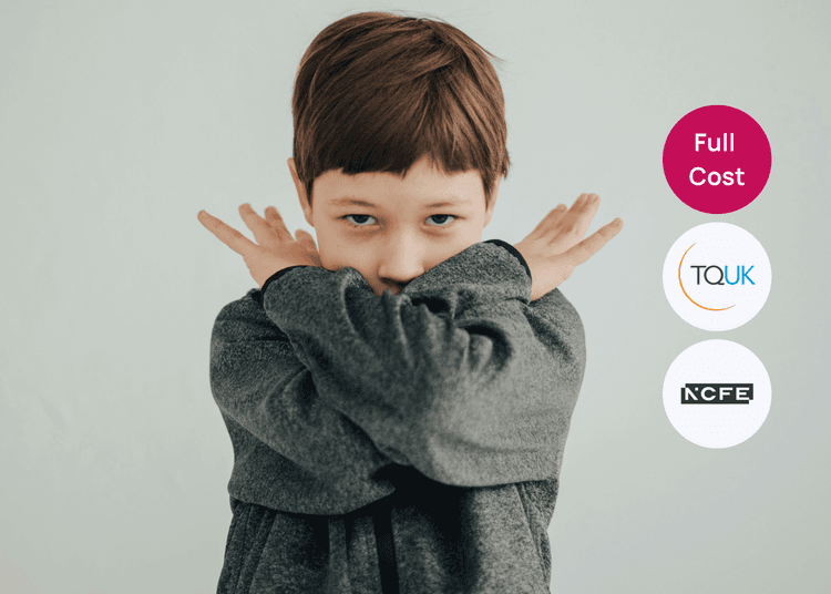 A child crossing their arms in front of their face, used to illustrate behaviour themes within training content. Child in a grey jumper holding arms crossed near the face against a plain background.