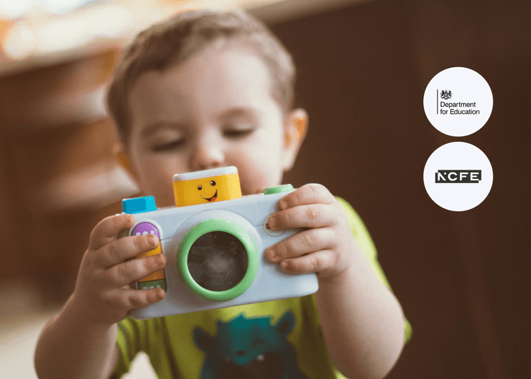 Build your career in Early Years with a Level 3 qualification. Young child playing with a toy camera beside the Department for Education logo.