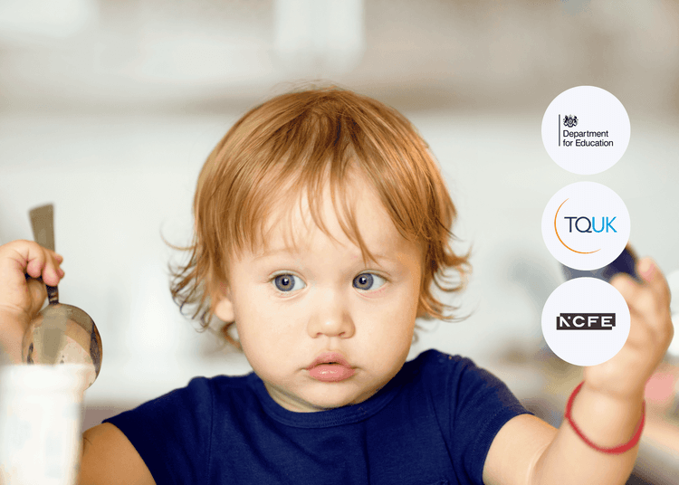 Toddler in a childcare setting, highlighting key themes in Level 2 Allergy Awareness for working with children. Young child with light brown hair holding a spoon and cup, looking ahead in a childcare setting.